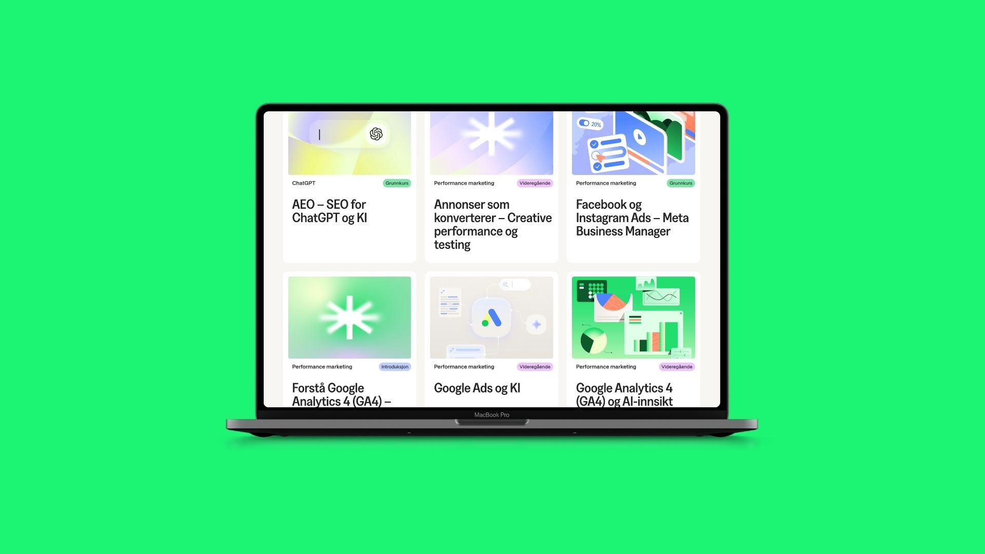 MacBook som viser kursoversikt med kurs i performance marketing, Google Ads, Google Analytics og Meta-annonsering på IGMs nettside.